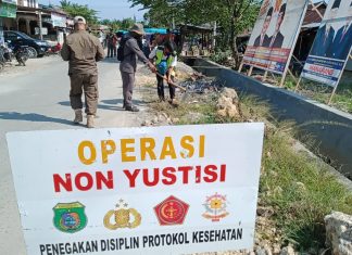 Operasi Gabungan Non-Yustisi: Tegakkan Perbub Pasangkayu Tentang Adabtasi Kebiasaan Baru