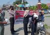 Peringati Hari Pahlawan, Polres Pasangkayu Bagi-bagi Masker