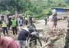 Personel Koramil 1428-03 Mambi Bantu Warga Terdampak Bencana di Aralle